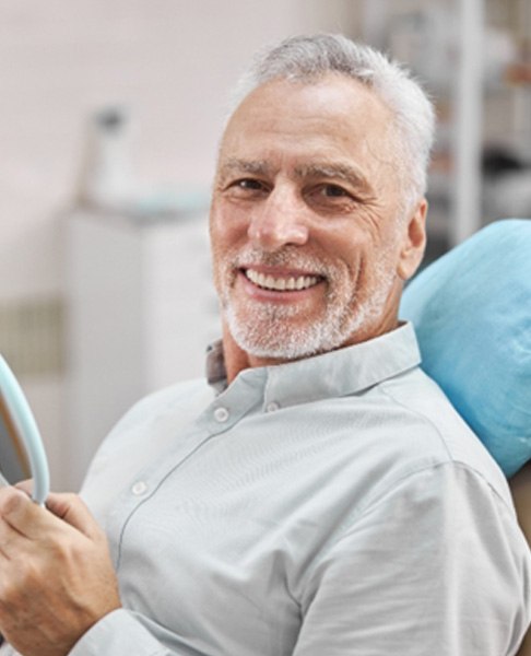 A smiling elderly man  