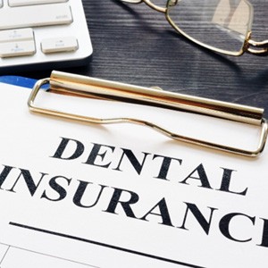 dental insurance form on table