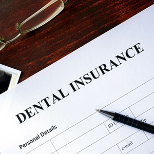 dental insurance form on table