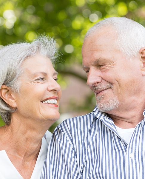 couple smiling at each other 