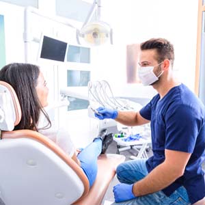 Woman at dental implant consultation