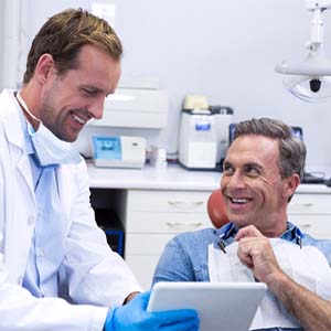 Man smiling at dentist