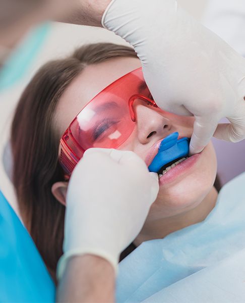 Patient receiving fluoride treatment