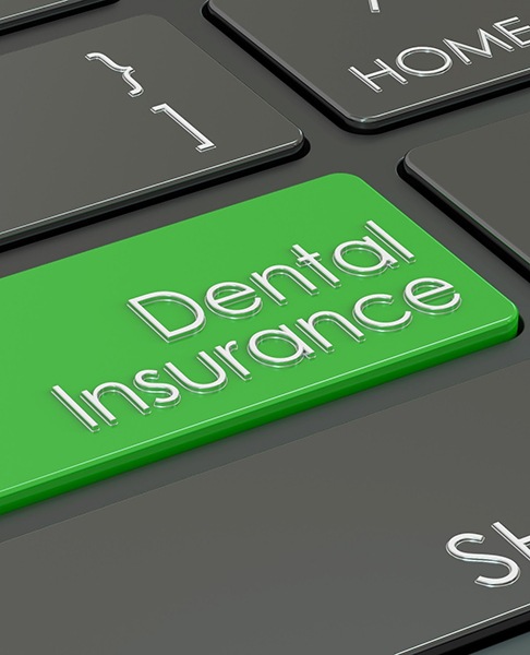 Dental insurance button on computer keyboard