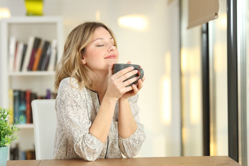 young woman drinking coffee