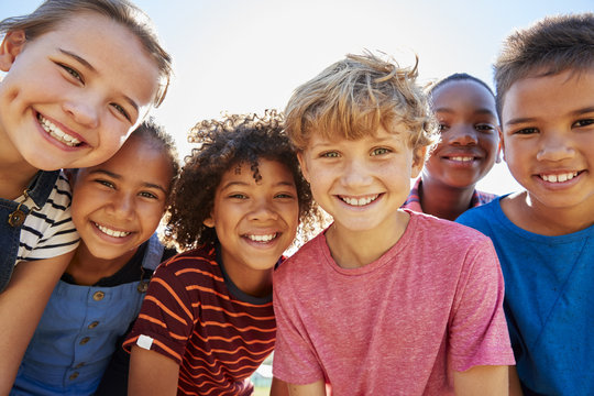 group of smiling children with great oral health