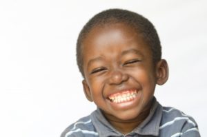 child smiling with healthy teeth