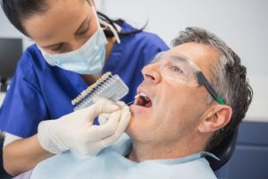 Man with gray hair getting veneers